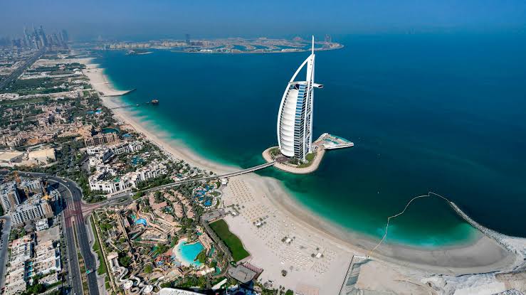 Dubai skyline with Burj Khalifa and traditional boat